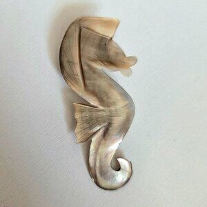 Vintage carved pinkish color Mother of Pearl seahorse brooch/pin.
